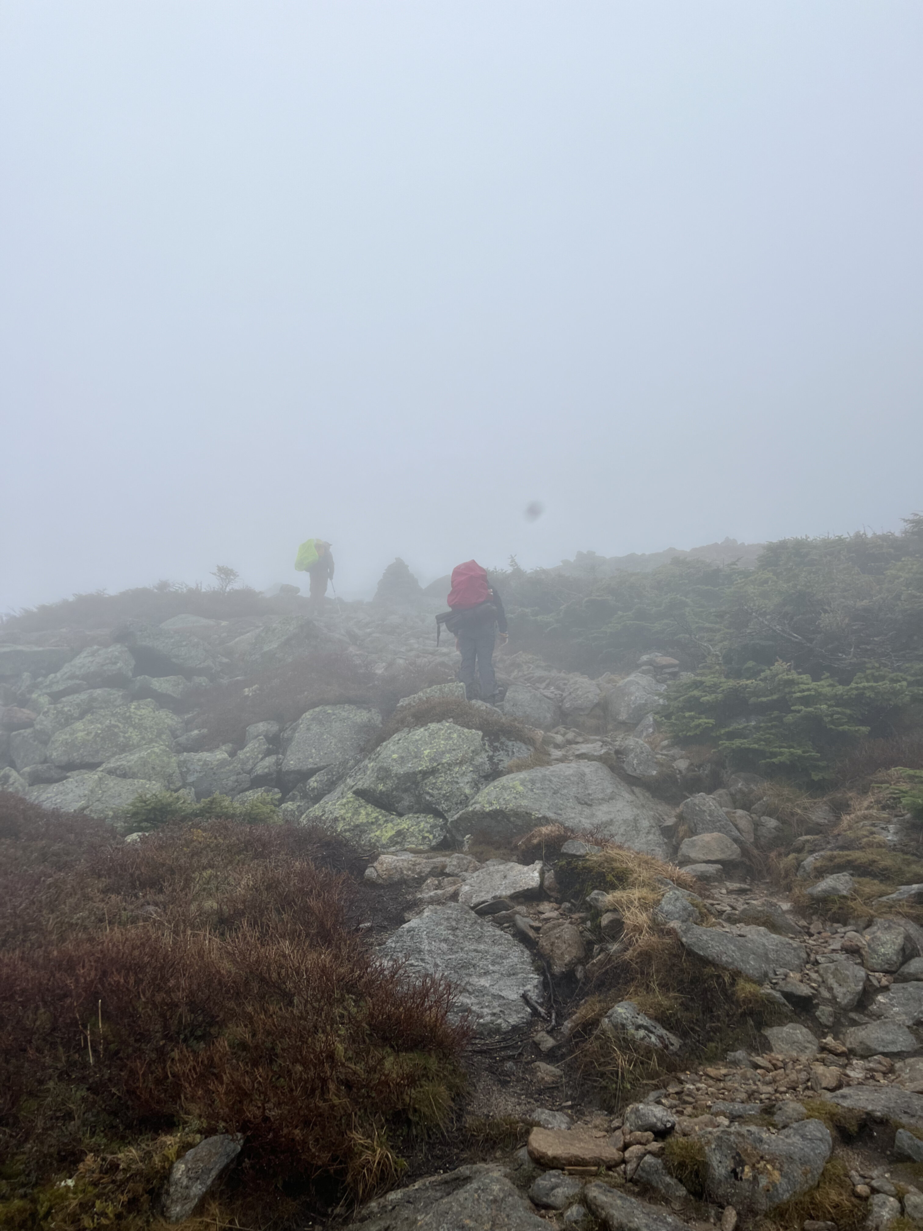 A foggy hike up a mountain